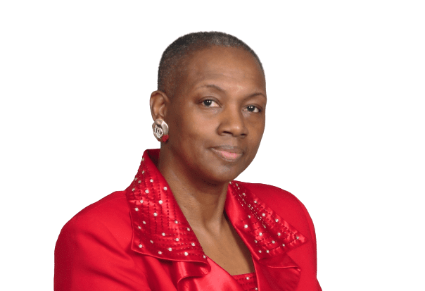 A woman in red jacket and earrings standing.